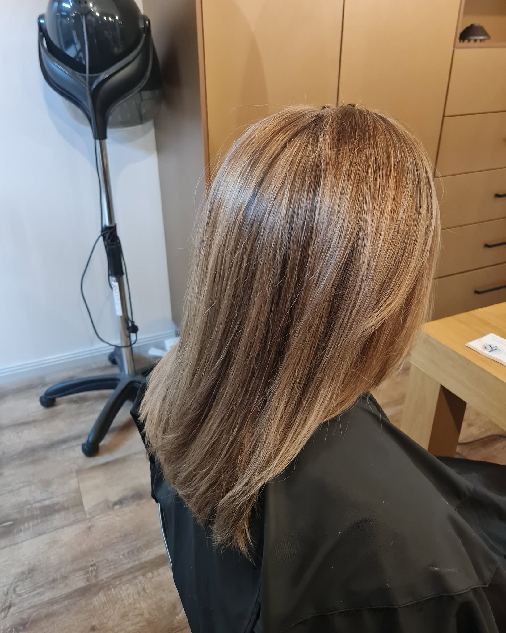Caramel balayage with a soft blow-wave